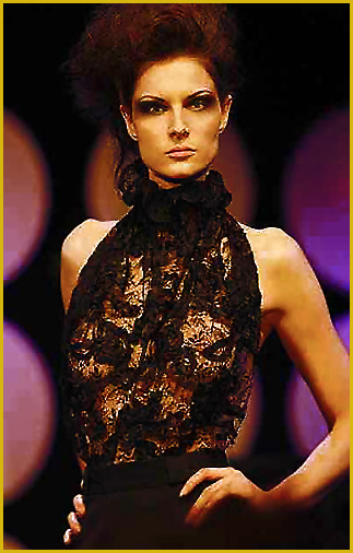 International model Dwina weares on the runway a black couture blouse from German fashion designer Torsten Amft to the Berlin Fashion Week - season fall/winter 2009-10 - click for back to the diary from designer Amft