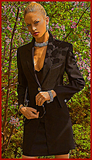 The model Vera Gafron in a noble precision measure costume, made of pure wool with certificate manufactured by German fashion designer Torsten Amft.